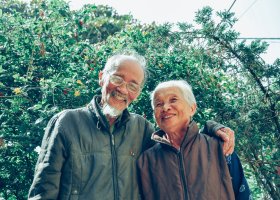 very elderly couple happy together